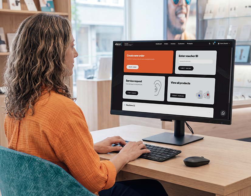 An audiology partner uses the Elacin Audiology Portal on a computer screen.